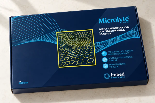 Illustrative photograph: Microlyte Matrix navy blue carton with cyan and yellow artwork